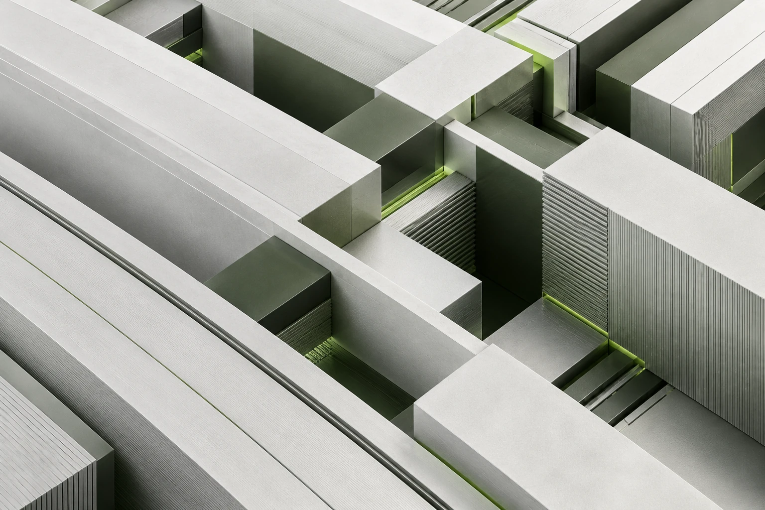 A wide abstract field of precisely machined mineral-white and olive cubic forms, separated by deep rectangular channels and fine lime-lit seams.